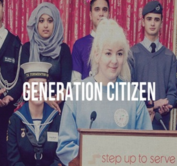 An image of young people at a youth social action event with the tagline "Generation Citizen", to represent Prof. Mills' research on "mapping the moral geographies of education" 